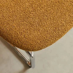 Cadeira em tecido bouclé com estrutura em metal, set de 2