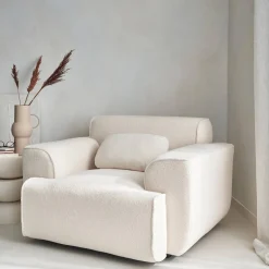 Poltrona de uma lugar em tecido boucle