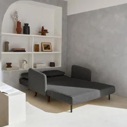 Sofá-cama em veludo canelado com pernas de madeira de 2 lugares