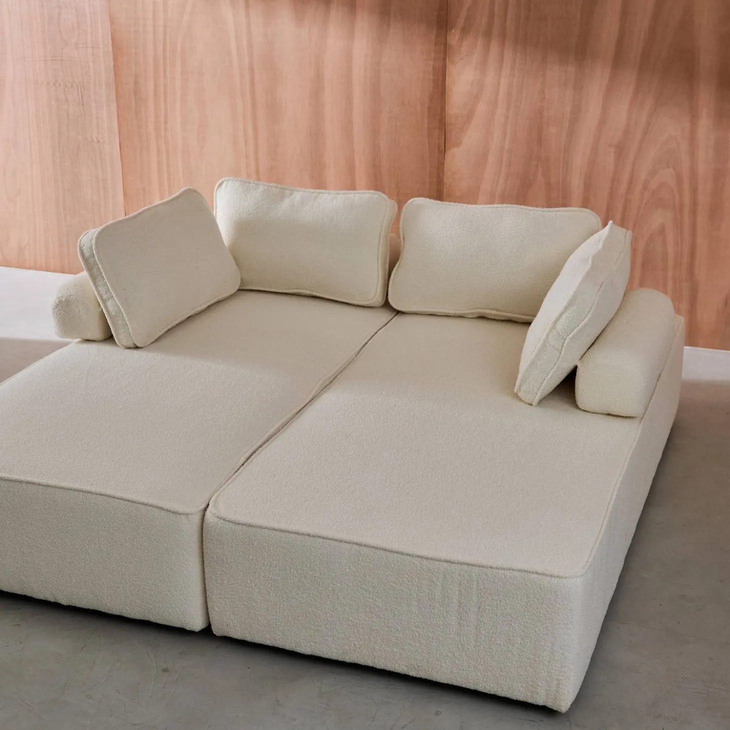 Sofá modular em tecido boucle de 4 lugares