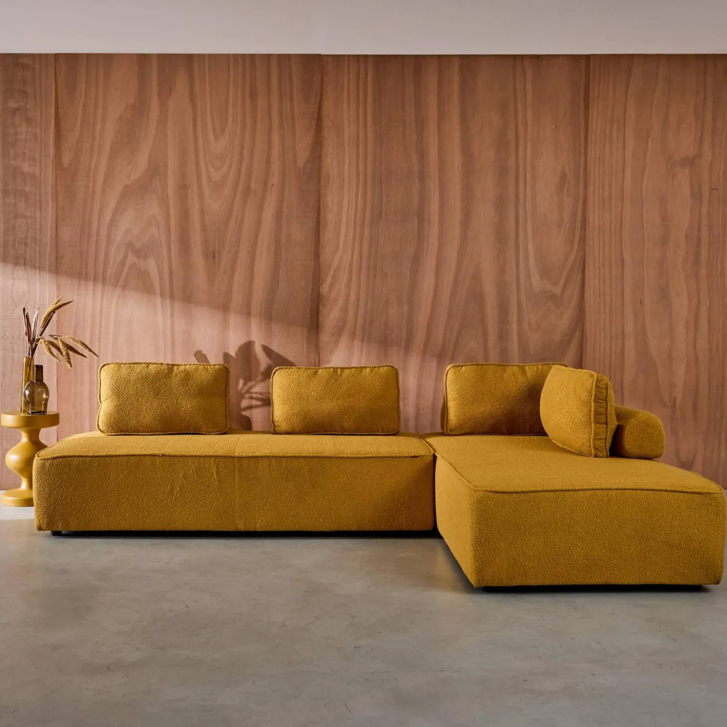 Sofá modular em tecido boucle de 4 lugares