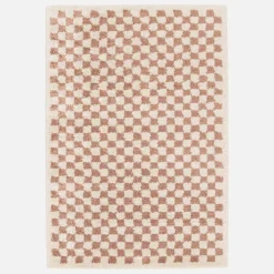 Tapete com padrão xadrez desgrenhado em rosa antigo e creme