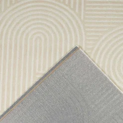 Tapete de interior creme com padrão gráfico de arcos